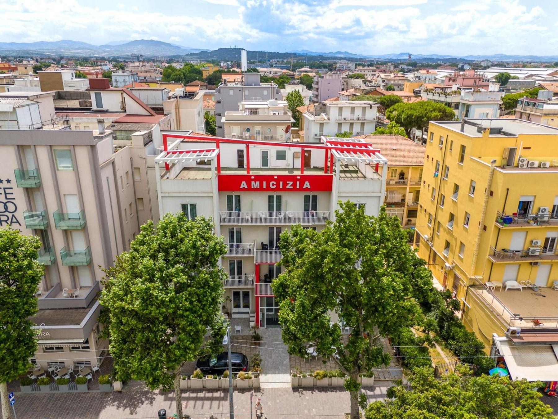 Hotel Amicizia Римини Экстерьер фото