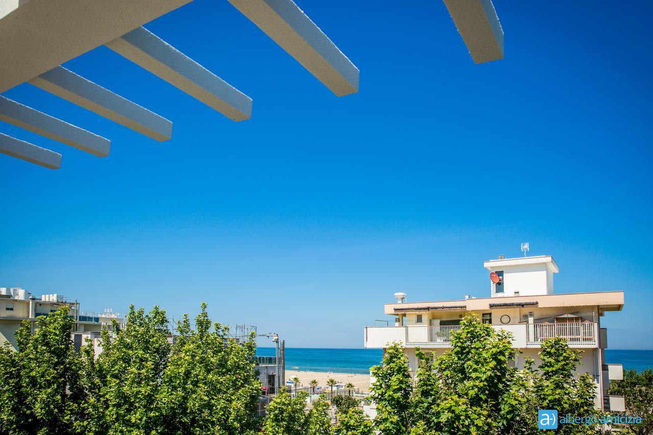 Hotel Amicizia Римини Экстерьер фото